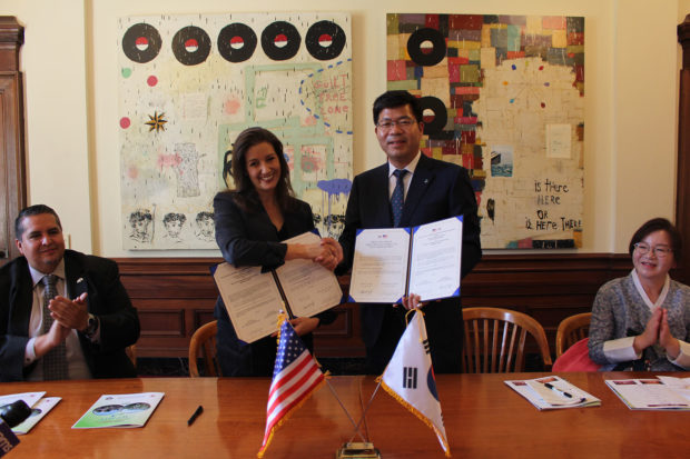 Photo: Oakland North. Oakland Mayor Libby Schaaf (left) shakes her hands with Pyeongtaek Mayor Jae-Kwang Kong at the ‘Friendship Relation City Signing Ceremony’ held at City Hall.